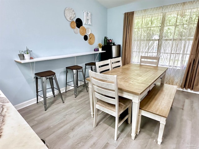 dining area featuring hardwood / wood-style flooring