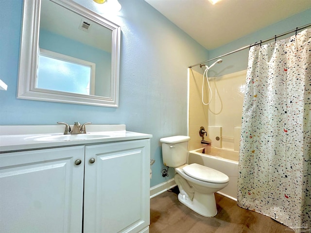 full bathroom featuring shower / bath combo, toilet, lofted ceiling, wood-type flooring, and vanity