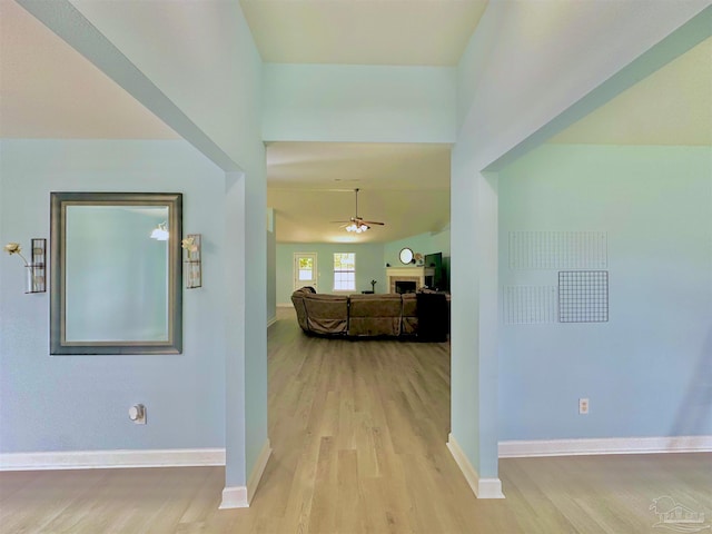 hallway with light wood-type flooring