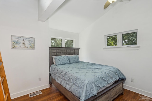 bedroom with ceiling fan, lofted ceiling, and dark hardwood / wood-style flooring