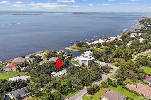 birds eye view of property featuring a water view