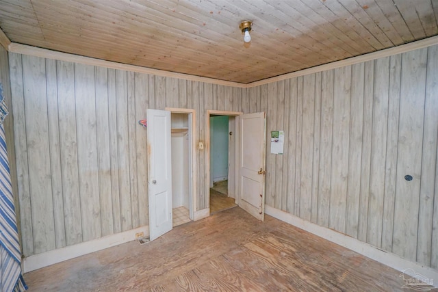 unfurnished room featuring wood ceiling