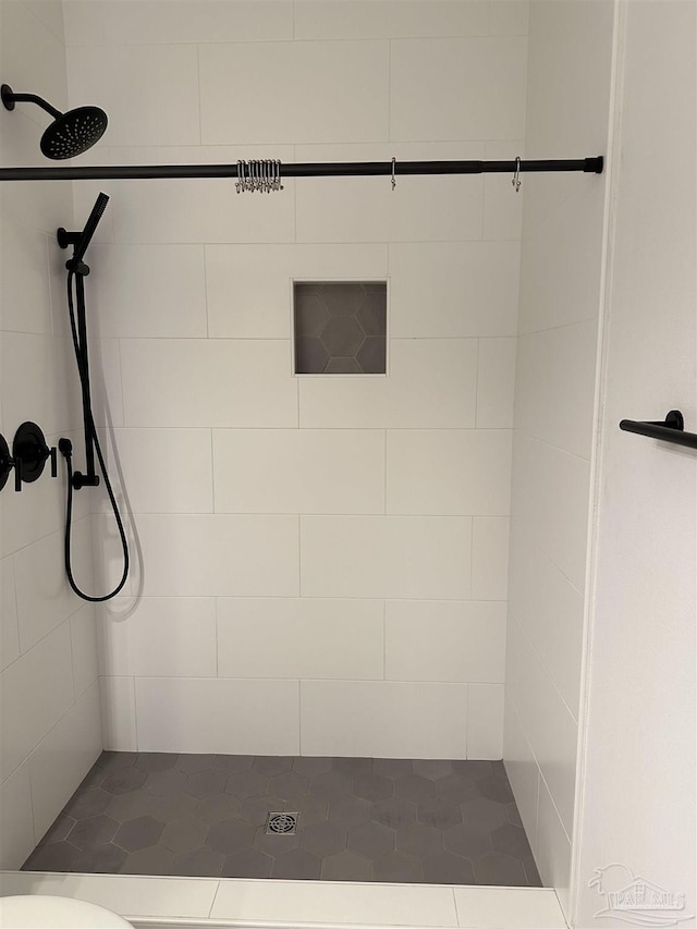 bathroom featuring a shower stall