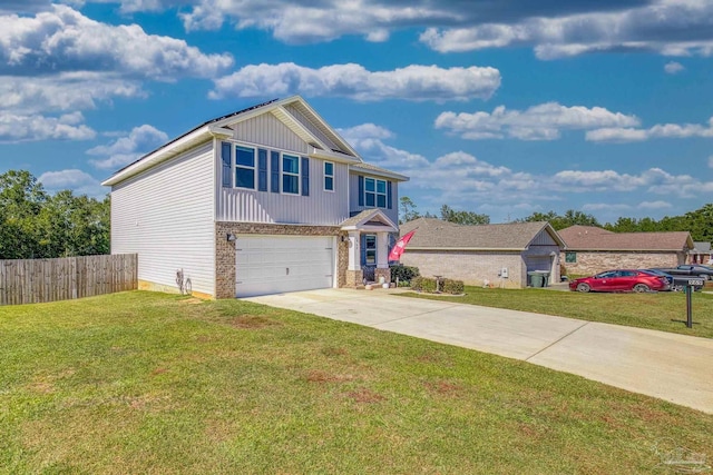 view of front of property with a front yard and a garage