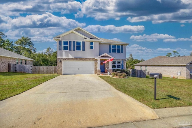 view of front of house featuring a front lawn and a garage