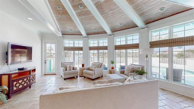 living area with beam ceiling, baseboards, wooden ceiling, and stone tile floors