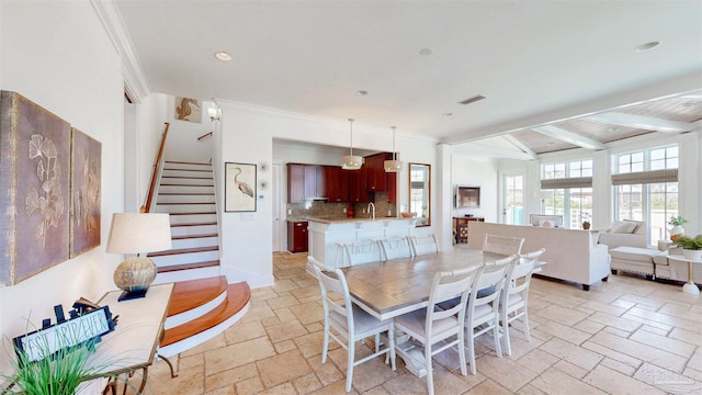 dining space with crown molding, visible vents, recessed lighting, stairway, and stone tile flooring