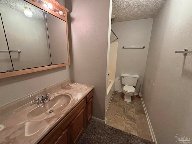 full bathroom featuring a textured ceiling, shower / bathtub combination, toilet, vanity, and baseboards