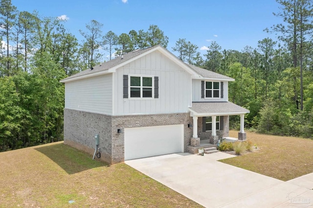 view of front facade with a front lawn and a garage