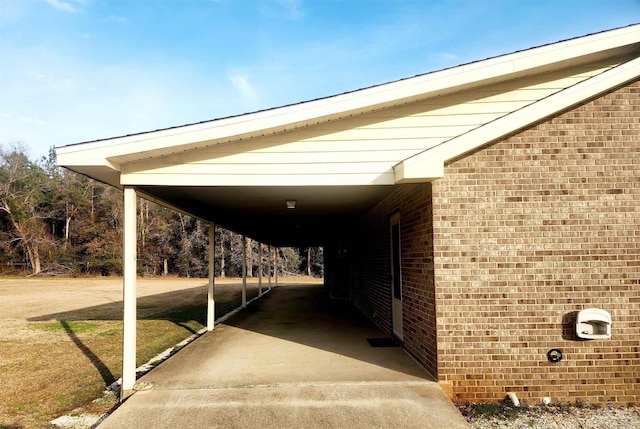 view of parking / parking lot with a carport