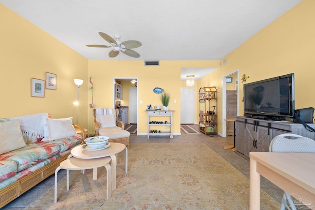 living room featuring ceiling fan