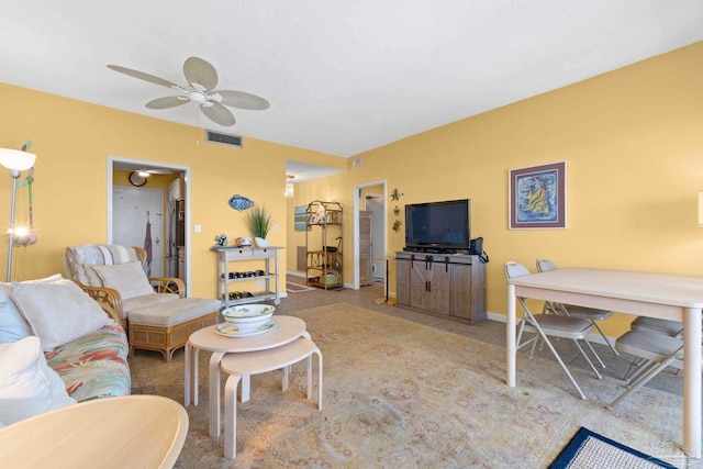 living room featuring ceiling fan