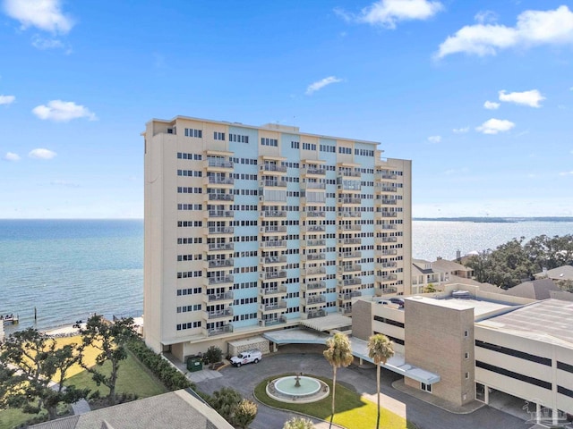 view of property with a water view