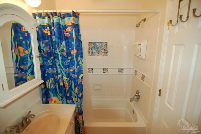 bathroom with vanity and shower / bath combo with shower curtain