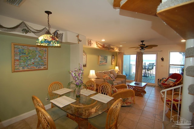 dining room featuring ceiling fan and light tile patterned floors