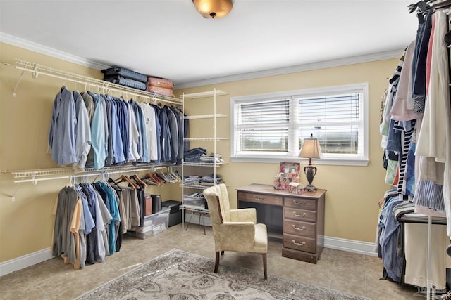 spacious closet with tile patterned floors