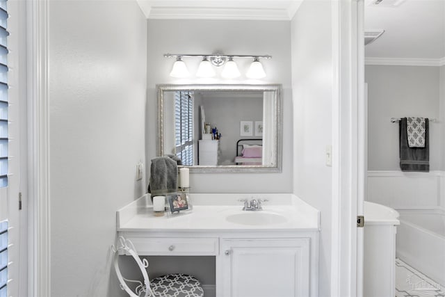 bathroom featuring vanity, ornamental molding, and visible vents