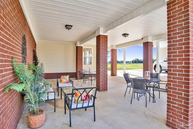 view of patio featuring outdoor dining space