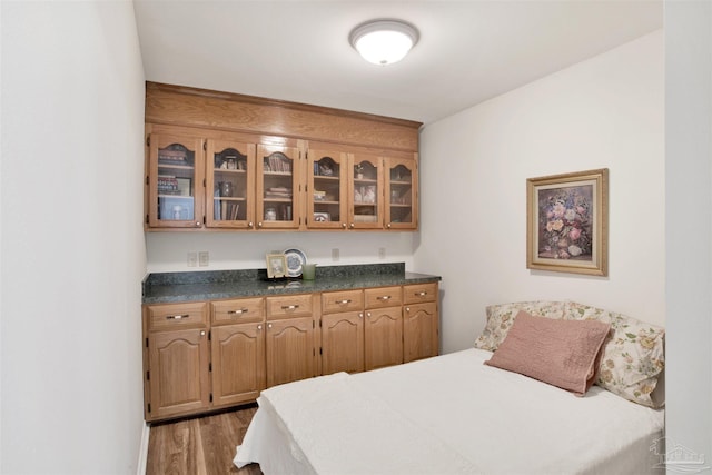 bedroom featuring light wood-style flooring