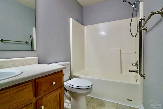 bathroom featuring vanity, tile patterned floors, toilet, and shower / tub combination