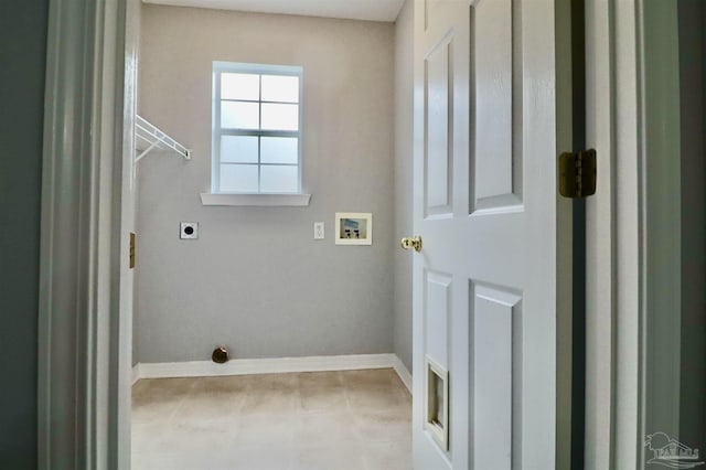 laundry room with electric dryer hookup, baseboards, and hookup for a washing machine