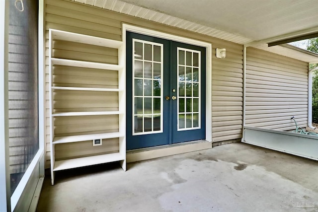 doorway to property featuring french doors