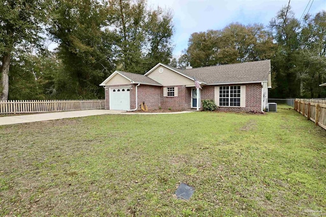 ranch-style house featuring brick siding, fence private yard, central AC, a front yard, and a garage