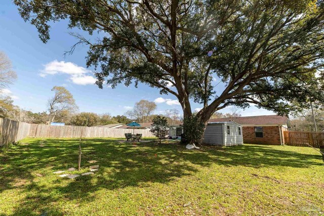 10870 Tara Dawn Cir, Pensacola, FL 32534 - view of yard with an outbuilding