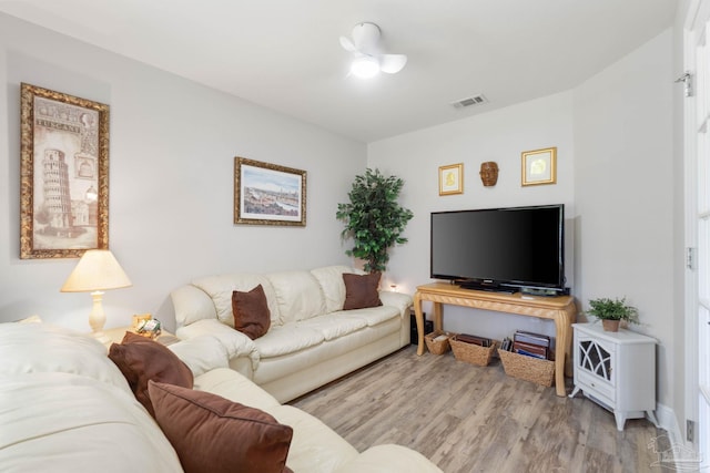 living room with light hardwood / wood-style floors