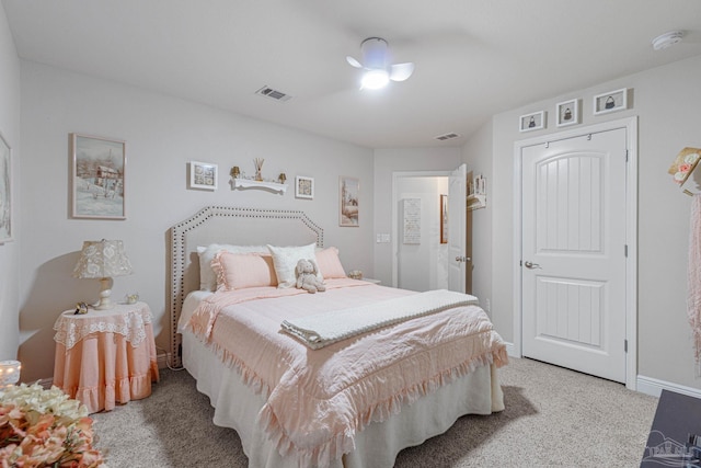 bedroom with light colored carpet