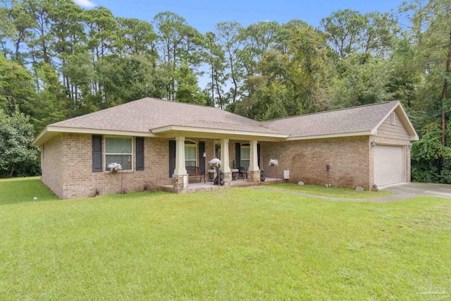 ranch-style house with a garage, a front lawn, and covered porch