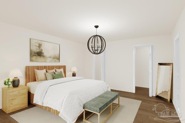 2821 Mandeville Ln, Pensacola, FL 32526 - bedroom with wood finished floors and a chandelier