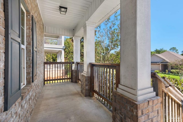 balcony featuring a porch