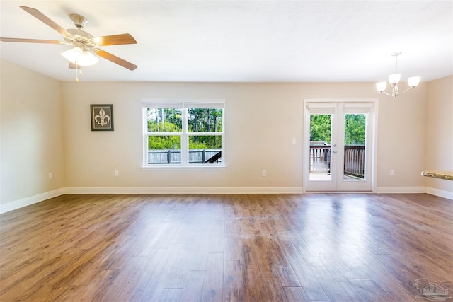 8626 Bucklebury Dr, Pensacola, FL 32507 - unfurnished room featuring baseboards, wood finished floors, and a wealth of natural light