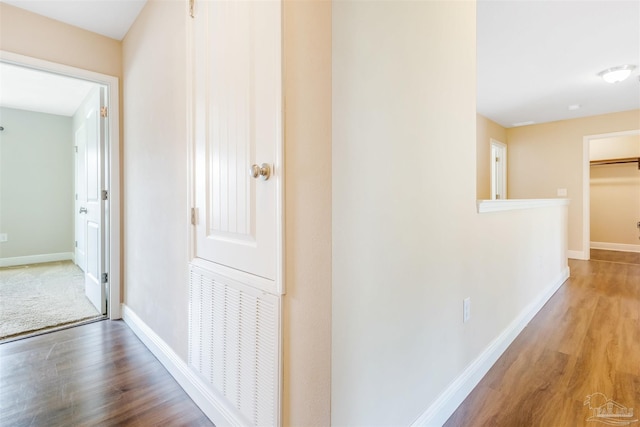 8626 Bucklebury Dr, Pensacola, FL 32507 - hallway with wood finished floors, visible vents, and baseboards