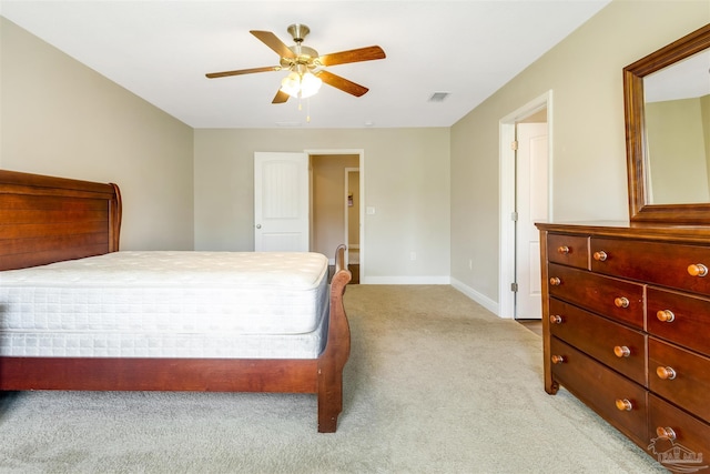 8626 Bucklebury Dr, Pensacola, FL 32507 - bedroom with baseboards, visible vents, light colored carpet, and ceiling fan