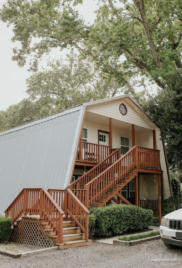 3125 Zepp Ln, Pace, FL 32571 - view of front of home featuring stairs and a porch