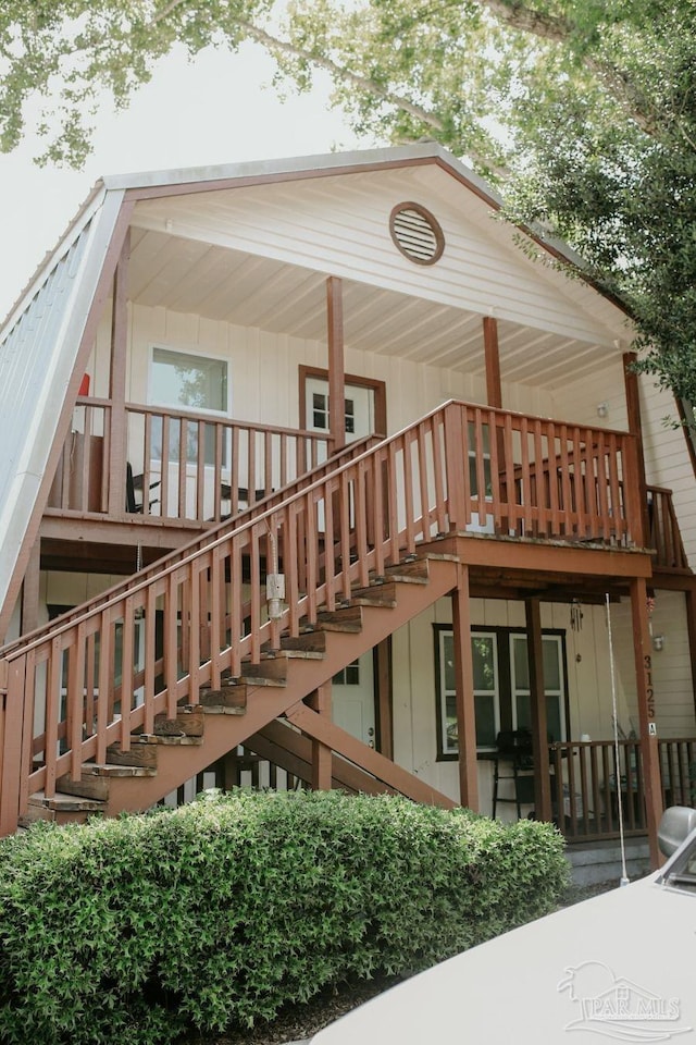 3125 Zepp Ln, Pace, FL 32571 - rear view of house featuring stairway