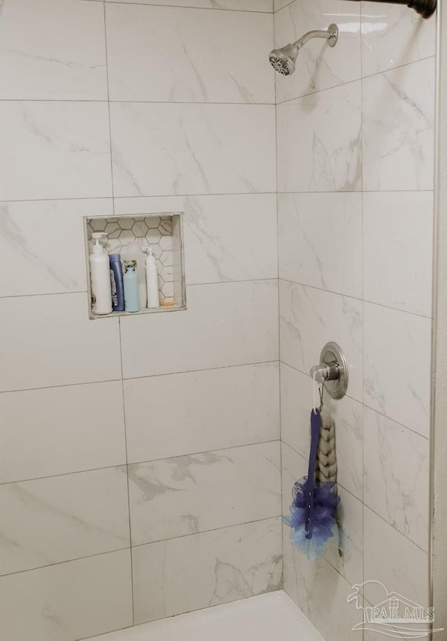 3125 Zepp Ln, Pace, FL 32571 - bathroom featuring tiled shower