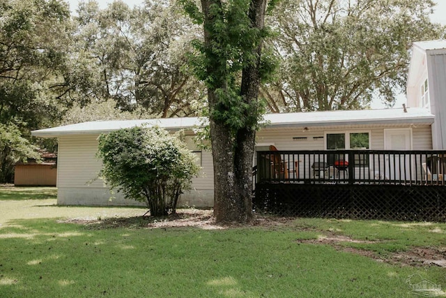 3125 Zepp Ln, Pace, FL 32571 - rear view of house with a yard and a deck