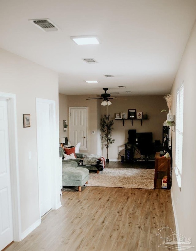 3125 Zepp Ln, Pace, FL 32571 - living area featuring light wood-type flooring, a desk, and ceiling fan