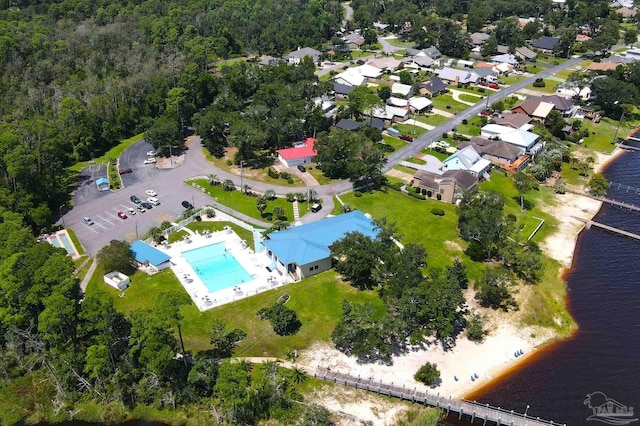 drone / aerial view with a water view