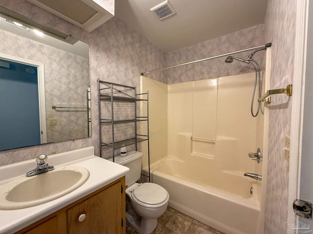 bathroom featuring toilet, shower / tub combination, vanity, visible vents, and tile patterned floors