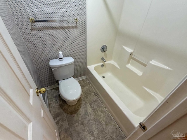 full bathroom featuring toilet