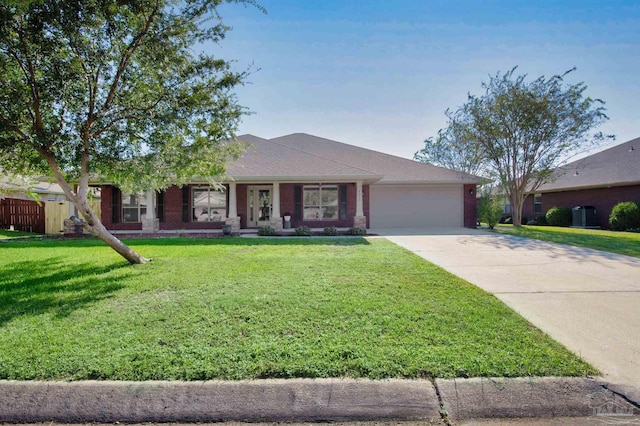 view of front facade featuring a front lawn and a garage