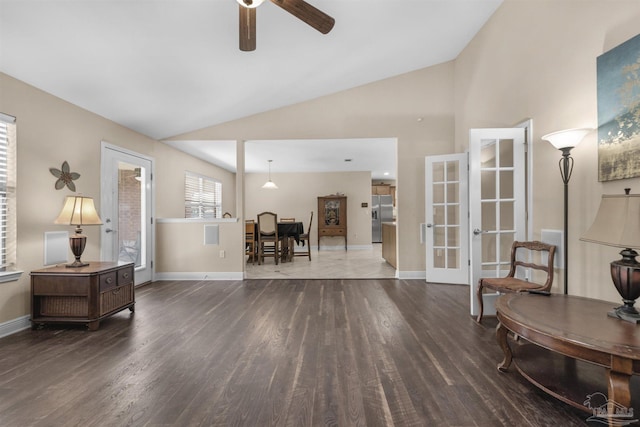 sitting room with french doors, ceiling fan, vaulted ceiling, and dark hardwood / wood-style floors