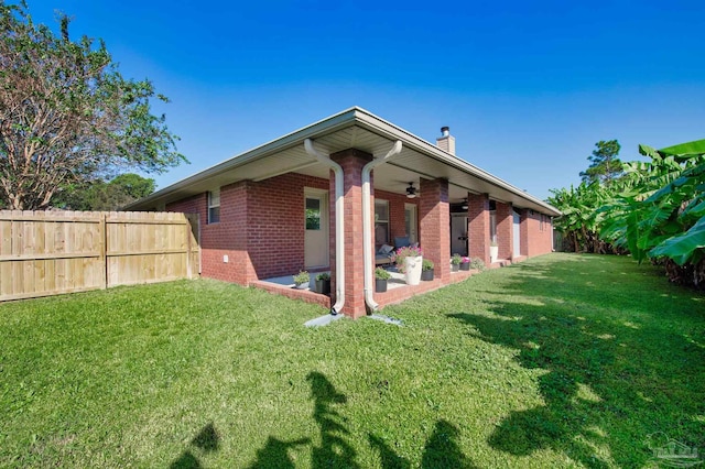 view of property exterior featuring a lawn