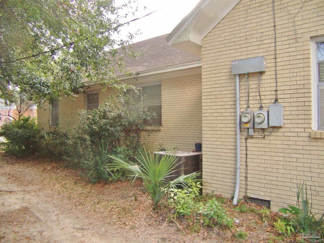 view of property exterior featuring central air condition unit