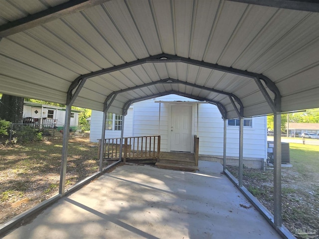 view of parking / parking lot featuring a detached carport