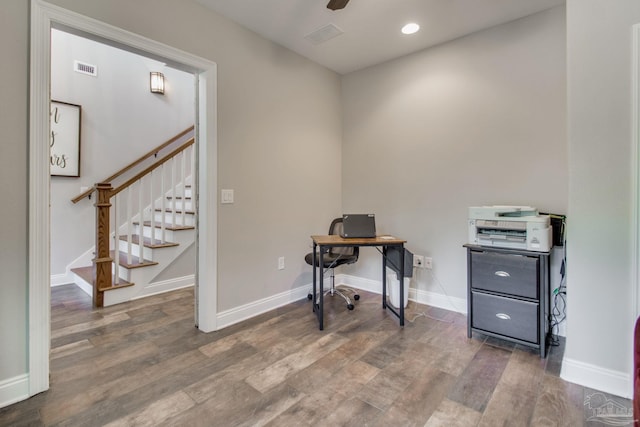 home office featuring ceiling fan and dark hardwood / wood-style flooring